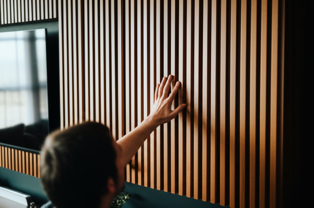 Tired of tech clutter? Unveil unique entertainment wall designs that blend style & function, transforming your living room into a stunning focal point.